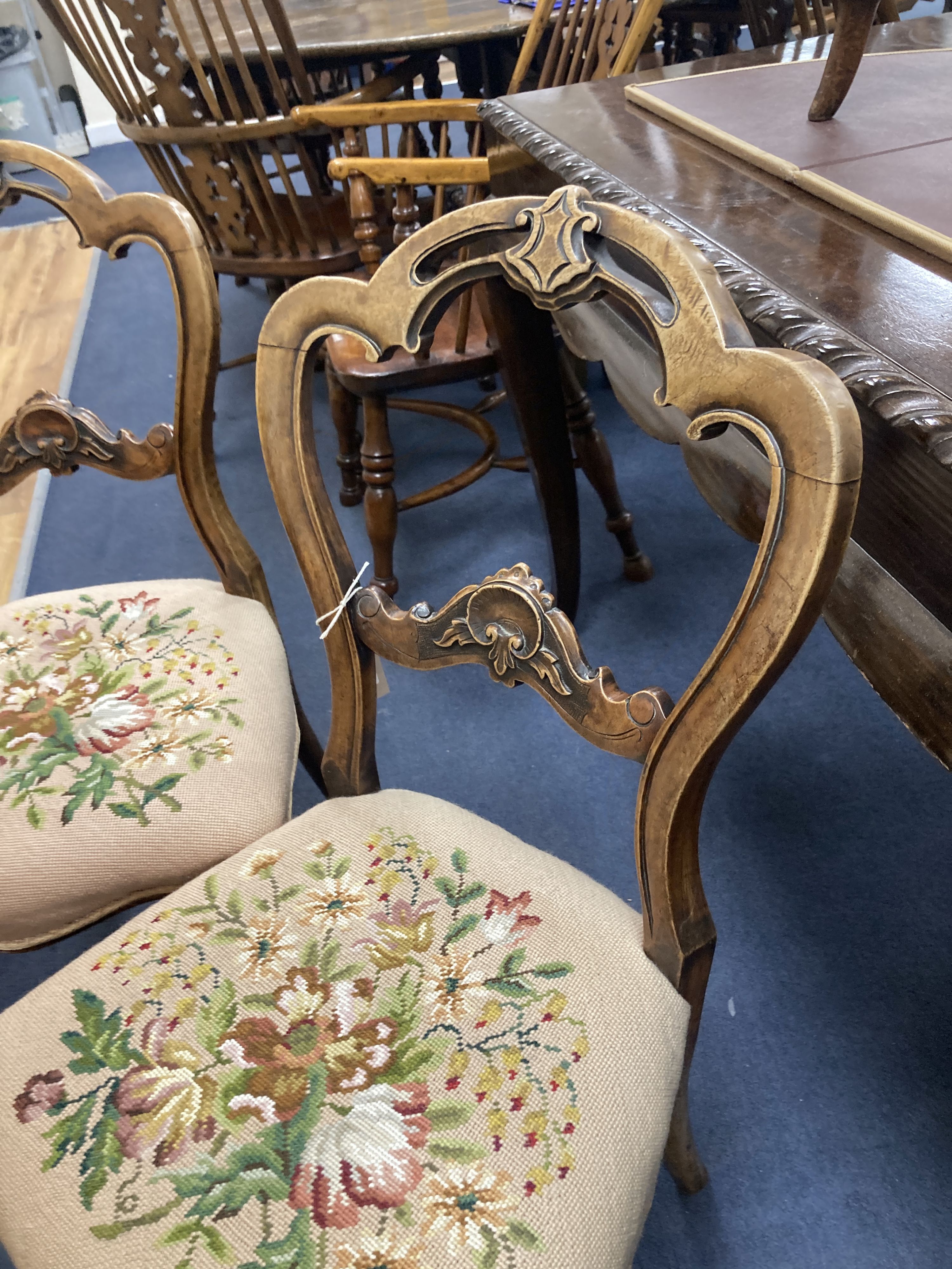 A pair of Victorian walnut side chairs